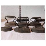 Set of 4 Antique Cast Iron Sad Irons with Extra Plate
