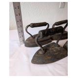 Set of 4 Antique Cast Iron Sad Irons with Extra Plate