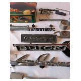 Vintage Automotive Emblems, Zippo-Style Lighters, and Collectibles Lot