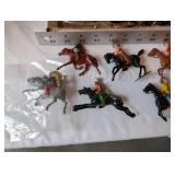 Collection of Vintage Plastic Cowboy and Native American Toy Figures on Horses