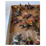 Collection of Vintage Plastic Cowboy and Native American Toy Figures on Horses