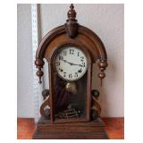 Antique Wooden Mantel Clock with Ornate Carvings and Key