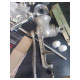 Mixed lot of household items New Grill Grates Shower Heads, and Antique Meat Grinder