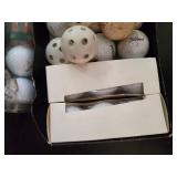 Golf Bag, Lots of Clubs, and Golf Balls