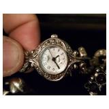 Nice collection of costume jewelry and watches in display case