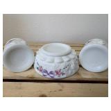 This is a vintage Westmoreland milk glass dresser set in the "Paneled Grape" pattern, hand-painted with a "Roses & Bows" design. The set includes two perfume bottles with stoppers, a covered powder bo