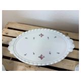 This is a vintage Westmoreland milk glass dresser set in the "Paneled Grape" pattern, hand-painted with a "Roses & Bows" design. The set includes two perfume bottles with stoppers, a covered powder bo