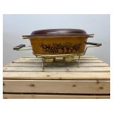 Vintage 045 Pyrex 2.5qt oval "Old Orchard" with 945-032 lid and warming stand