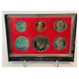 1981 Proof Set (6 coins) - No external case, significant fire damage evident