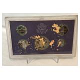 1986 Proof Set (5 coins) - No external case, fire damage evident