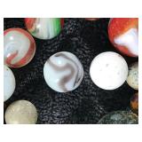 Lot of Collectible Marbles and Some of the Glow Green when you put a black light on them