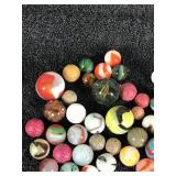 Lot of Collectible Marbles and Some of the Glow Green when you put a black light on them