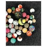 Lot of Collectible Marbles and Some of the Glow Green when you put a black light on them