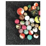 Lot of Collectible Marbles and Some of the Glow Green when you put a black light on them