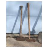 2 Spade Shovels - 2 - Pitch Forks - 2 - Axes and one has a mall on one side