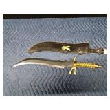 Ornate Ambian Scimitar sword with eagle sheath and gold twisted handle