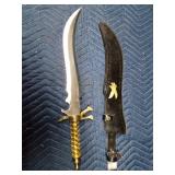 Ornate Ambian Scimitar sword with eagle sheath and gold twisted handle
