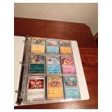 Binder of 90 Pokemon trading cards