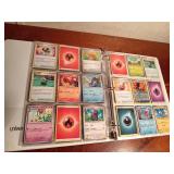 Binder of 9+0 Pokemon trading cards