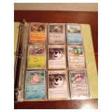 Binder of Pokemon trading cards