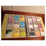 Binder of Pokemon trading cards