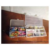 1 plastic 2-sided tackle box and 1 plastic tackle box of jigs, spinners and more