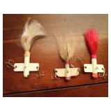 3 vintage lead fishing lures with horsehair tails and multiple hooks