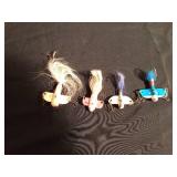 4 Vintage lead fishing lures with horsehair tails and multiple hooks