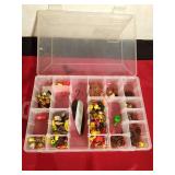 Plastic Plano tackle box of fishing jigs, hooks, spoon, sinkers and more