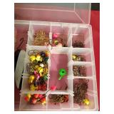 Plastic Plano tackle box of fishing jigs, hooks, spoon, sinkers and more