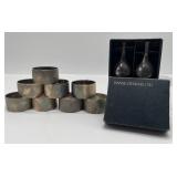 Pair of Dansk IHQ Candleholders and 9 Brushed Metal Napkin Rings