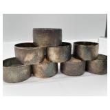 Pair of Dansk IHQ Candleholders and 9 Brushed Metal Napkin Rings