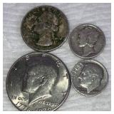Three Silver Coins and Half Dollar
