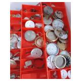 Expandanding Tool Box filled with watch parts for repair or craft