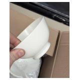 Two Boxes Filled With White Dishes