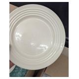 Two Boxes Filled With White Dishes