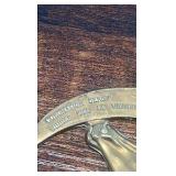 2 brass racing horse themed medallions