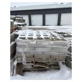 Two Stacked Pallets Of Concrete Block