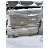 Two Stacked Pallets of Concrete Blocks