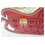 FAO Schwarz Red Wooden Christmas Sleigh Advent Calendar w/25 numbered drawers (battery operated LED lights)