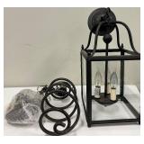 Black Iron Lantern Pendant Light and a Industrial Style Iron Swirl Light