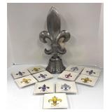 A & B Home Fleur-de-Lis Finial on Pedestal with 11 Creative Co-op Small Plates