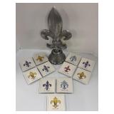 A & B Home Fleur-de-Lis Finial on Pedestal with 11 Creative Co-op Small Plates