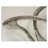 Two Abstract Metal Sculptures and Welcome Sign