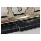 Two Abstract Metal Sculptures and Welcome Sign