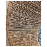 Round Wall Mirror with Textured Brown Rattan Frame