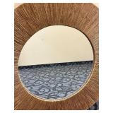 Round Wall Mirror with Textured Brown Rattan Frame