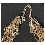 LL-ST - Gold-Tone Multi-Strand Crystal Necklace with 2-Inch Floral Pendant, 22-Inch Length