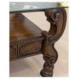 LR - Ashley Furniture Margilles Glass-Top Coffee Table Dark Wood, Ornate Base