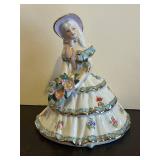 LL - 7-Inch Porcelain Figurine - Woman in Tiered Floral Dress With Bouquet